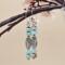 Handmade earrings with stacked sea sediment jasper beads and an ornate antiqued silver center bead.